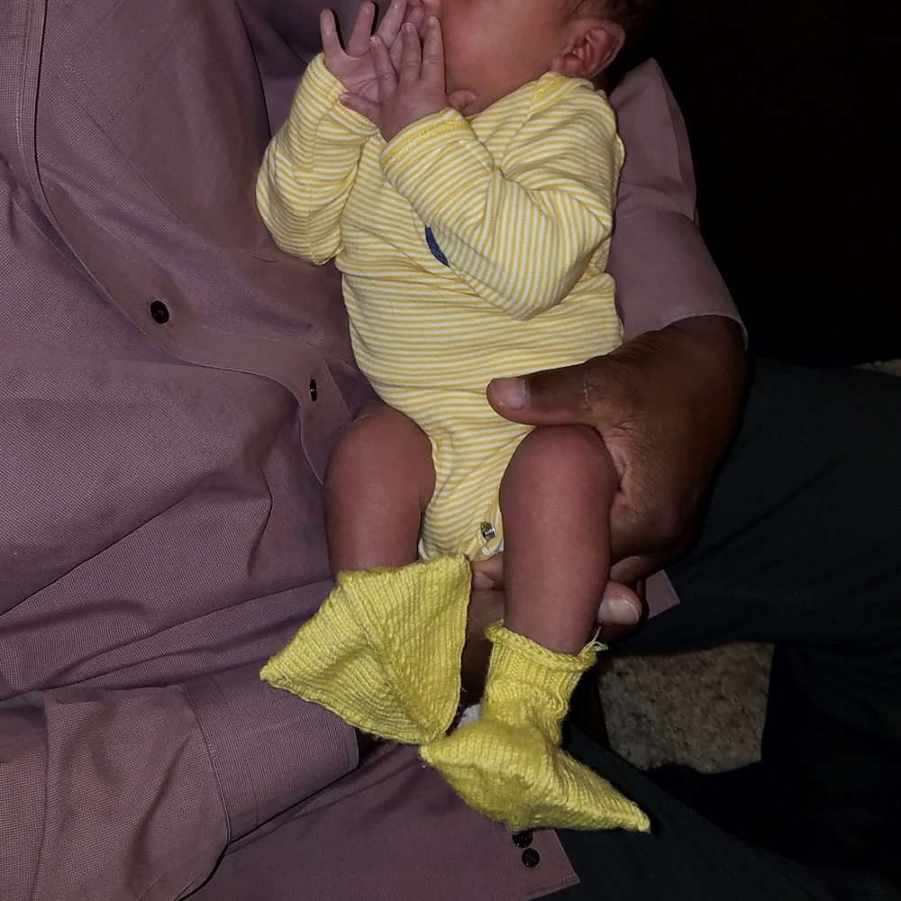 Knitted duck baby booties/ new ones not my baby's!
